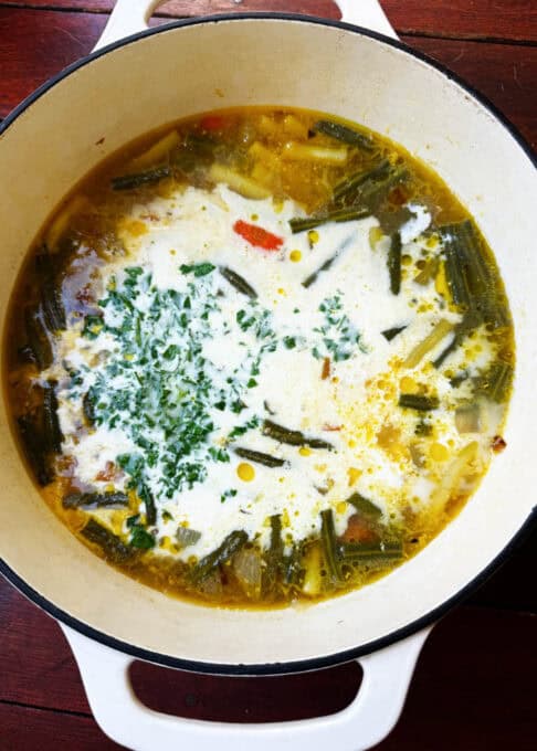 Heavy cream and parsley added to the soup