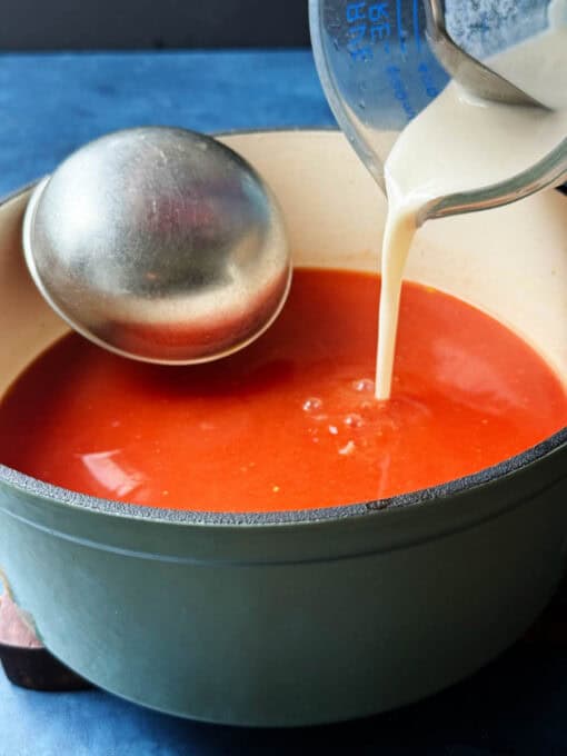 Slurry being poured into the sauce