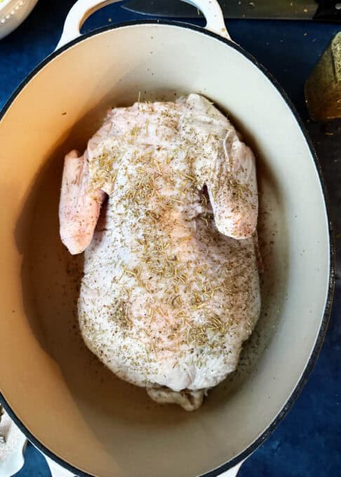 Duck is placed in Dutch oven