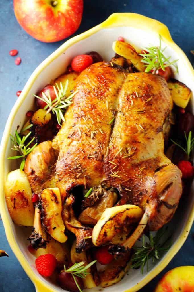 Roast duck stuffed with apples recipe in a Dutch oven