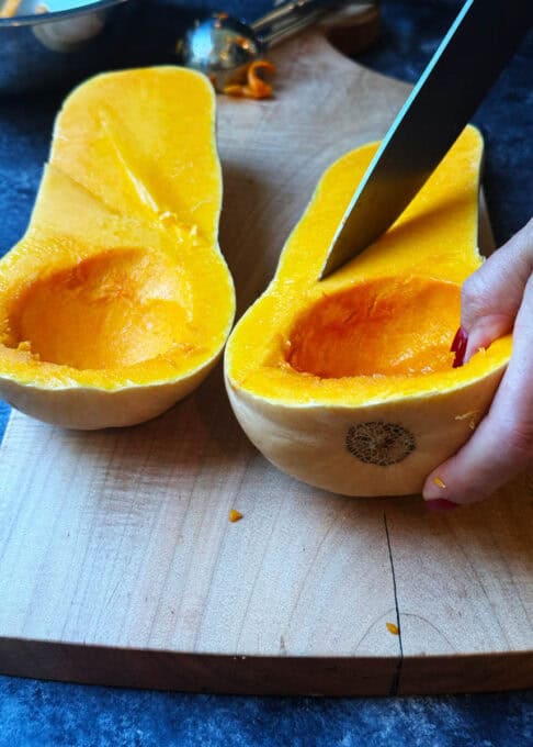 Scoring the flesh of the butternut