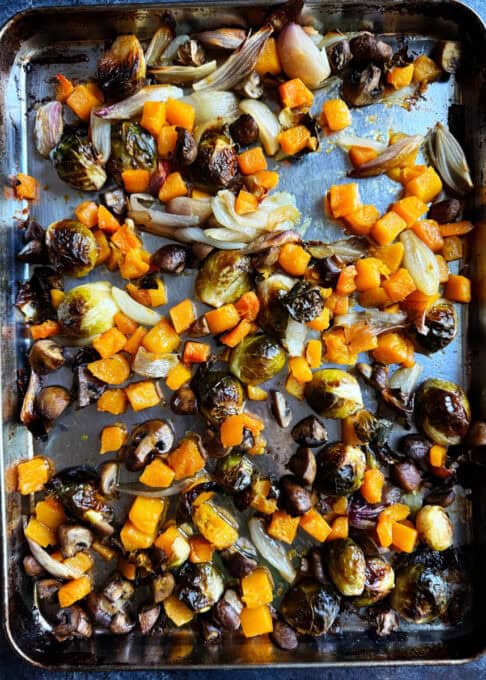 Roasted fall vegetables on a baking sheet
